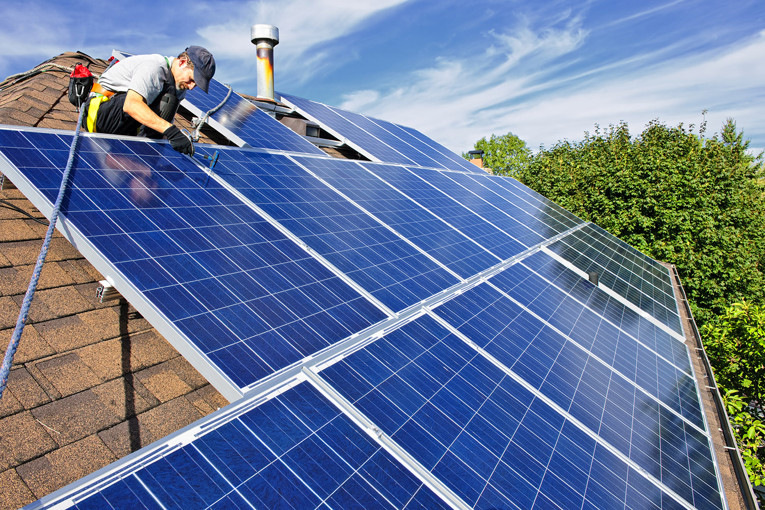 Lapeyre Construction roofing professionals working on a roof in Travis County, TX