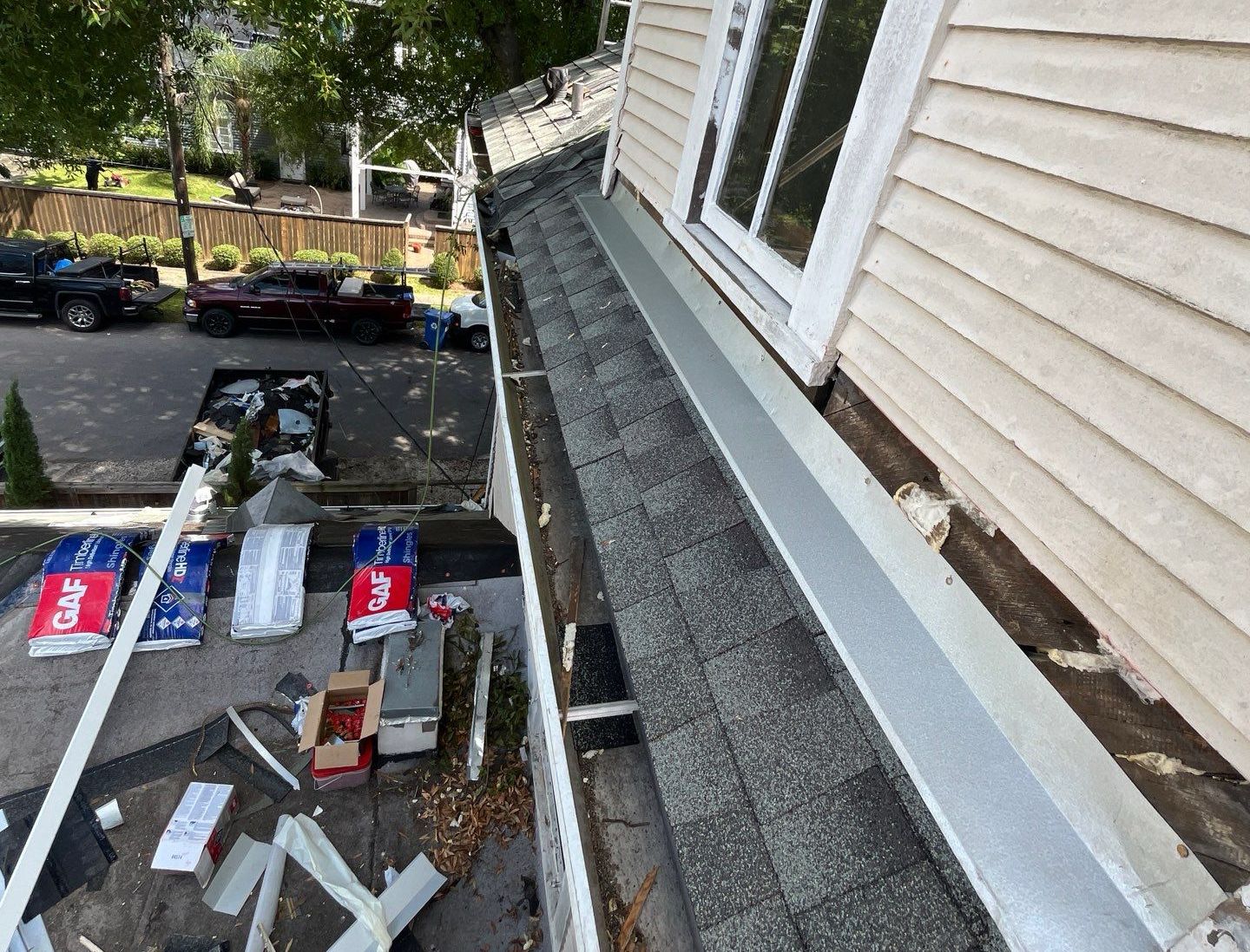 Experienced roofing team from Lapeyre Construction working on a Louisiana roof