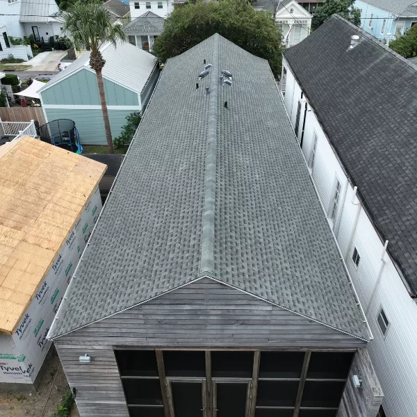 Expert roofing contractors from Lapeyre Construction fortifying a New Orleans home under the Louisiana Fortify Homes Program.
